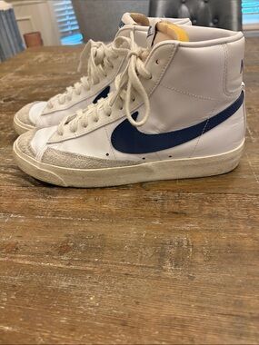 Nike Women’s White High-Top Sneakers with Navy Swoosh size 9
